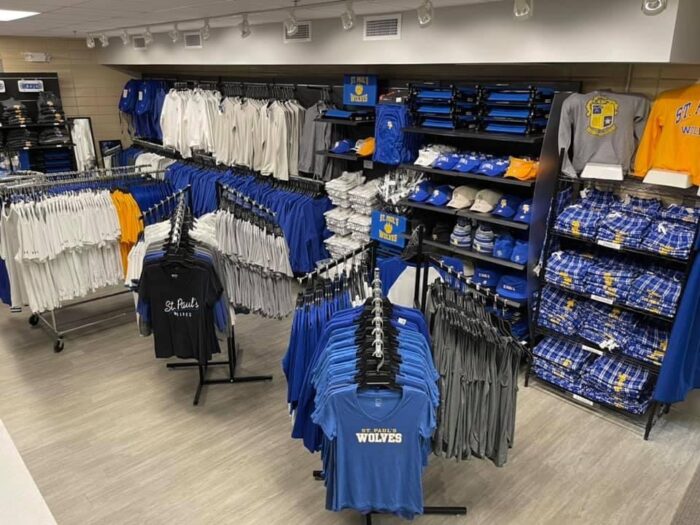 Clothing store interior with racks of shirts and jackets, ideal for students at St. Paul's School or other private schools on the Northshore.
