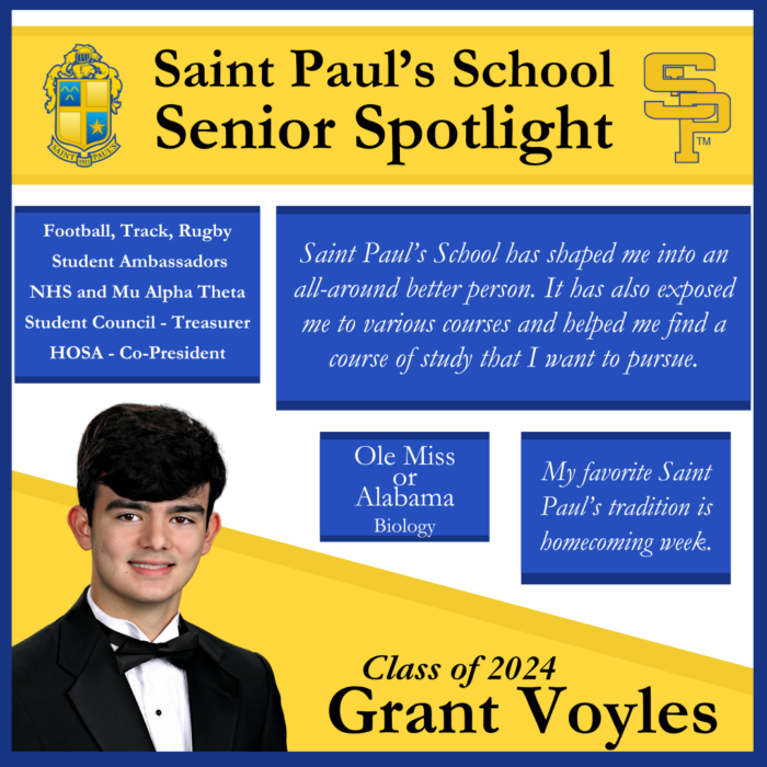 A student in a suit poses beside his achievements and future plans for St. Paul's School, a leading school for boys on the Northshore, LA.
