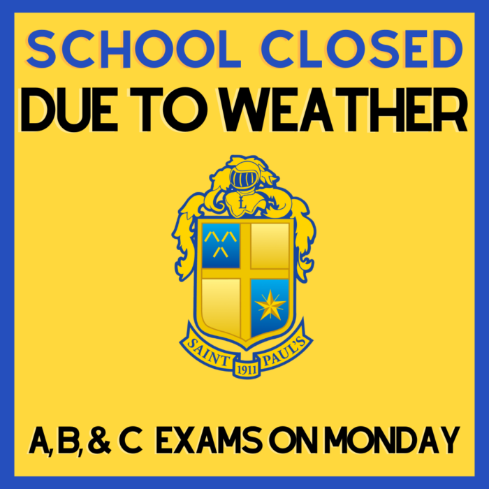 A yellow sign with blue border reads 