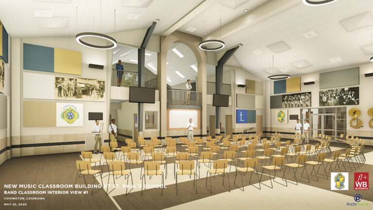 A large music classroom at St. Paul’s School features rows of chairs, music stands, wall art, a balcony, and observers.
